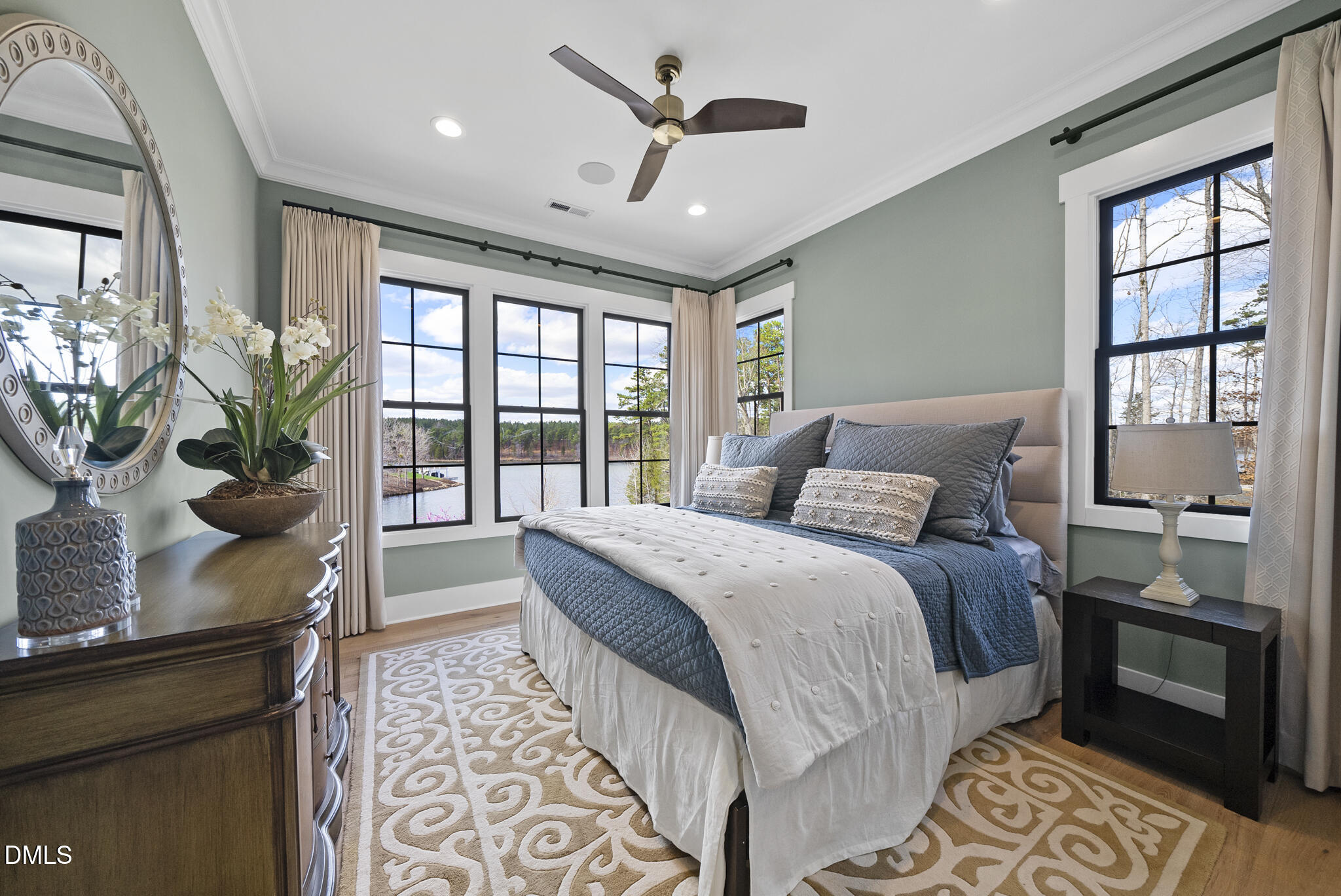 935 Estate Road Semora, NC 27343 - Photo 40 of 75 a bedroom with a bed and a potted plant