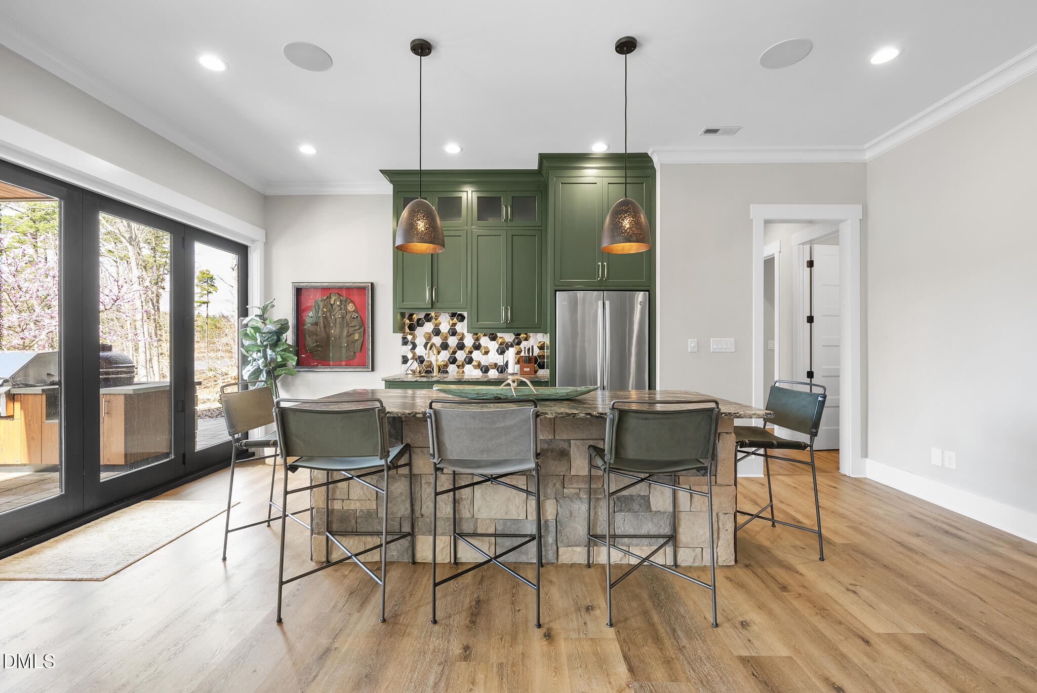 935 Estate Road Semora, NC 27343 - Photo 46 of 75 a dining room with furniture a chandelier and wooden floor