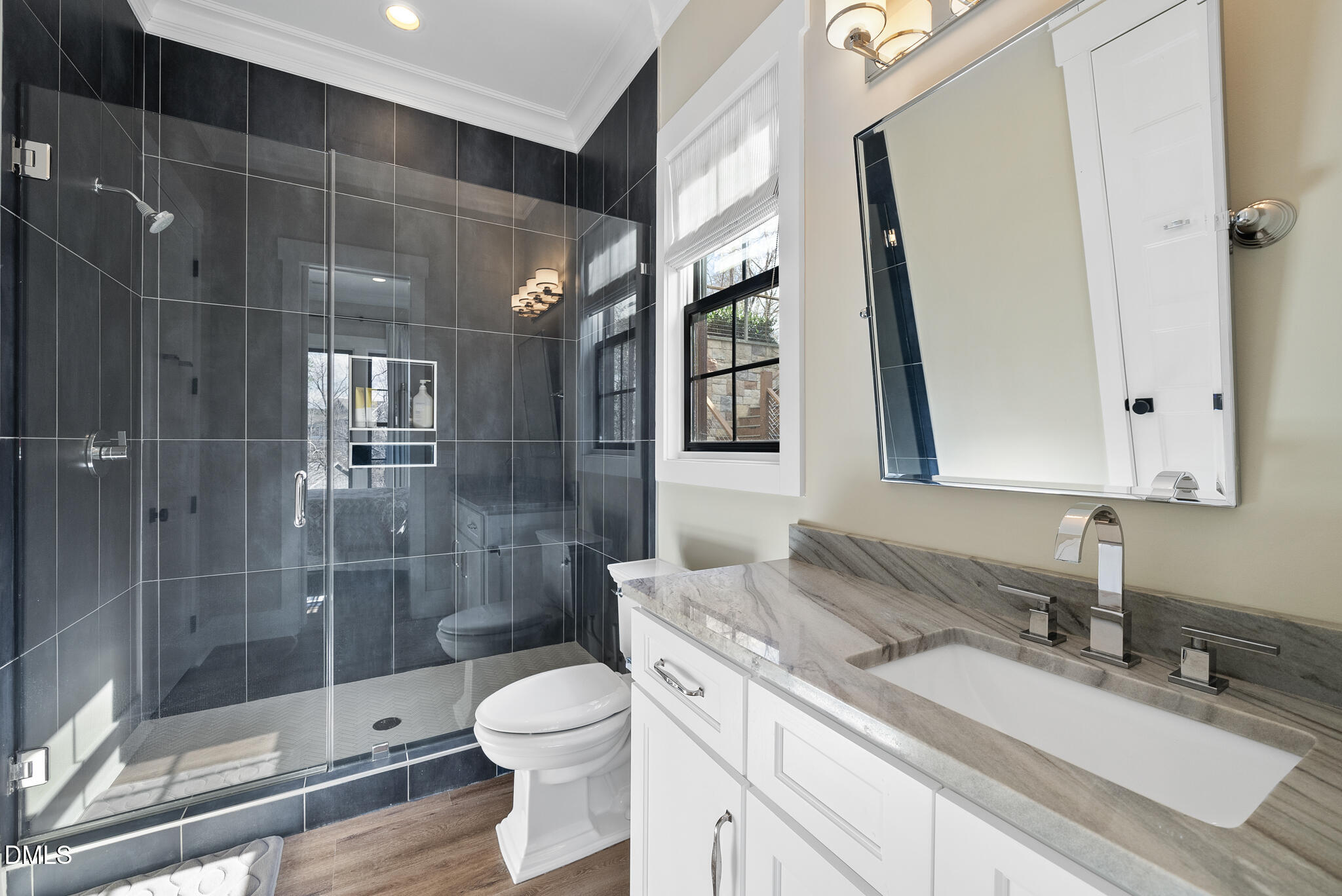 935 Estate Road Semora, NC 27343 - Photo 55 of 75 a bathroom with a granite countertop sink toilet and shower