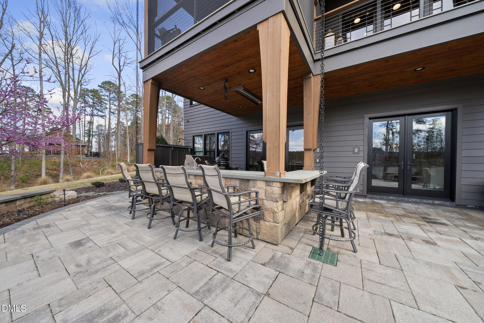 935 Estate Road Semora, NC 27343 - Photo 58 of 75 a view of a patio with table and chairs and potted plants