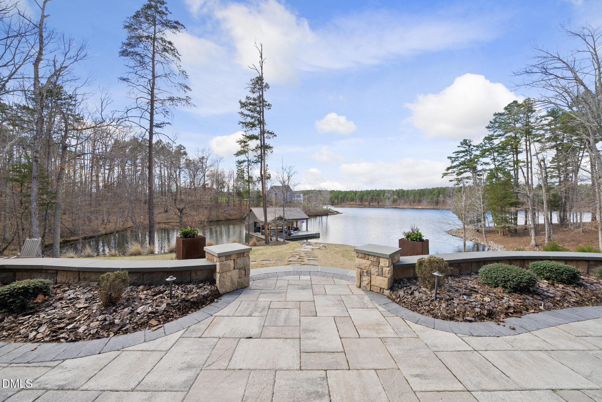 935 Estate Road Semora, NC 27343 - Photo 59 of 75 a view of a fountain and tables in the patio