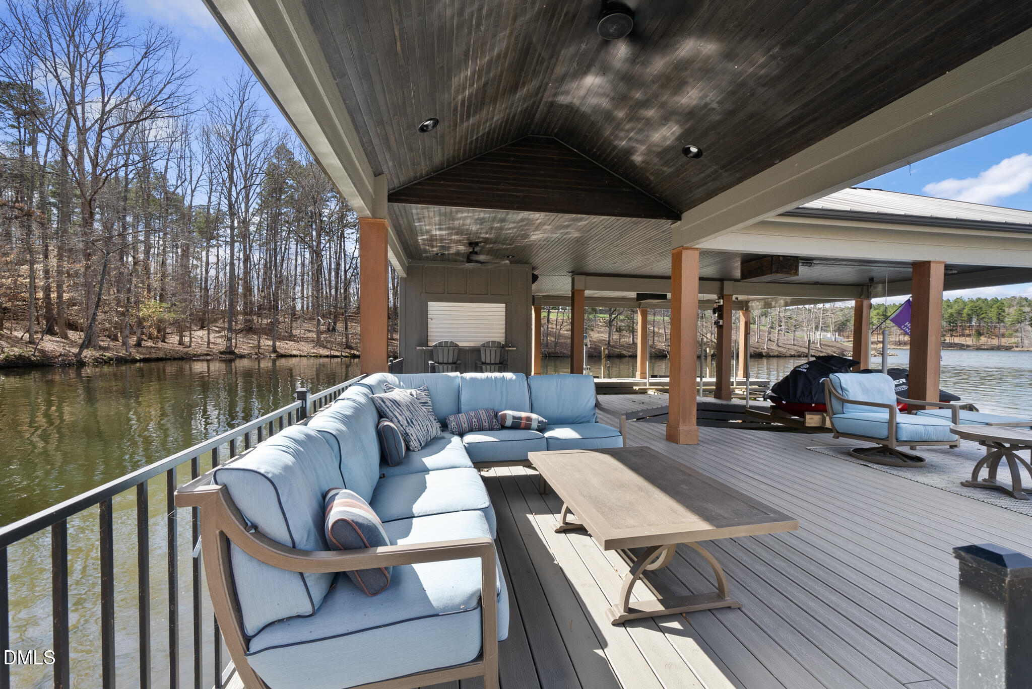935 Estate Road Semora, NC 27343 - Photo 62 of 75 a view of balcony with couch and wooden floor