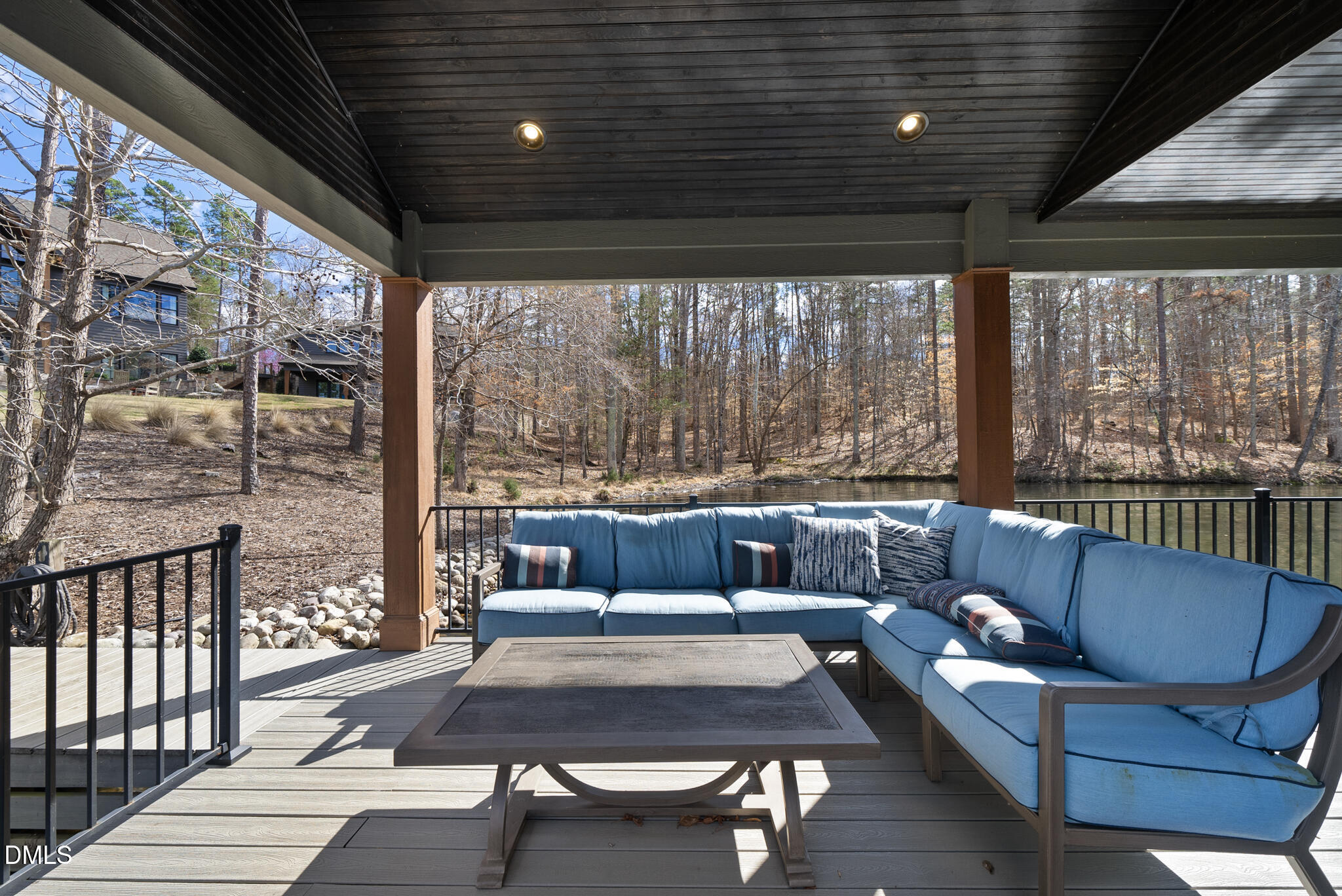 935 Estate Road Semora, NC 27343 - Photo 66 of 75 a living room with furniture and a floor to ceiling window