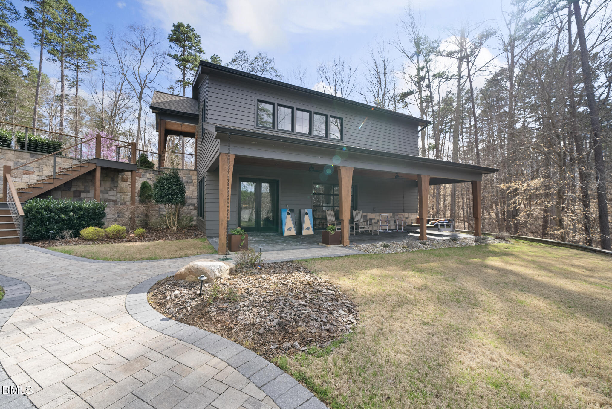 935 Estate Road Semora, NC 27343 - Photo 67 of 75 a view of a house with floor to ceiling windows and a basket ball poll