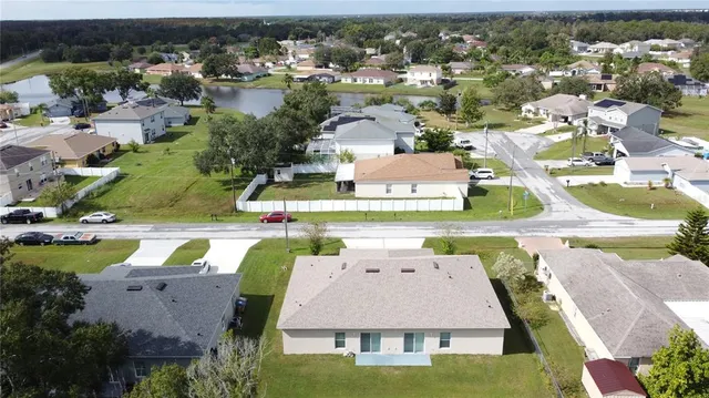 an aerial view of a house with a garden