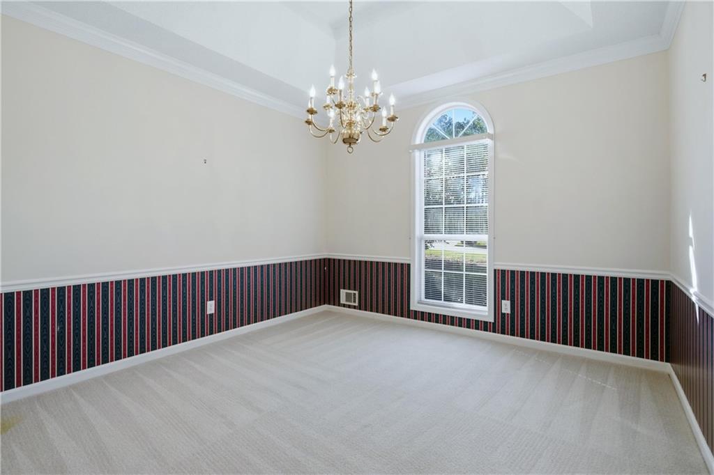 190 Cambridge Way Covington, GA 30016 - Photo 15 of 51 a view of a livingroom with chandelier chandelier