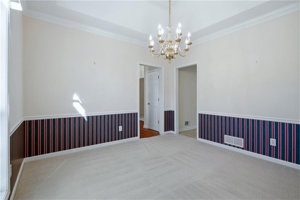 190 Cambridge Way Covington, GA 30016 - Photo 16 of 51 a view of a balcony with chandelier