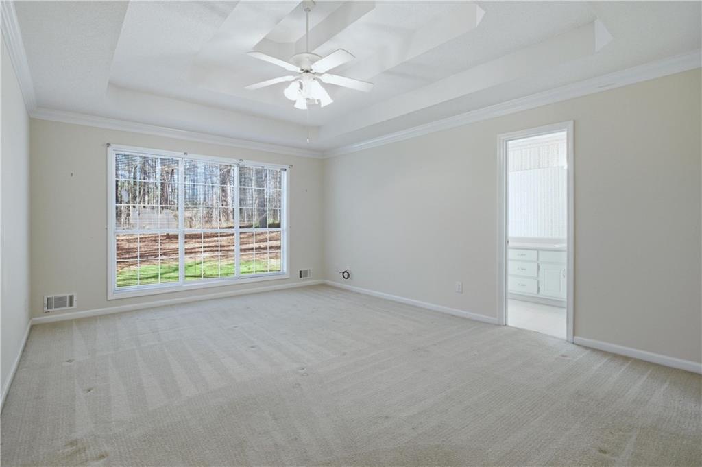 190 Cambridge Way Covington, GA 30016 - Photo 20 of 51 a view of an empty room with a window