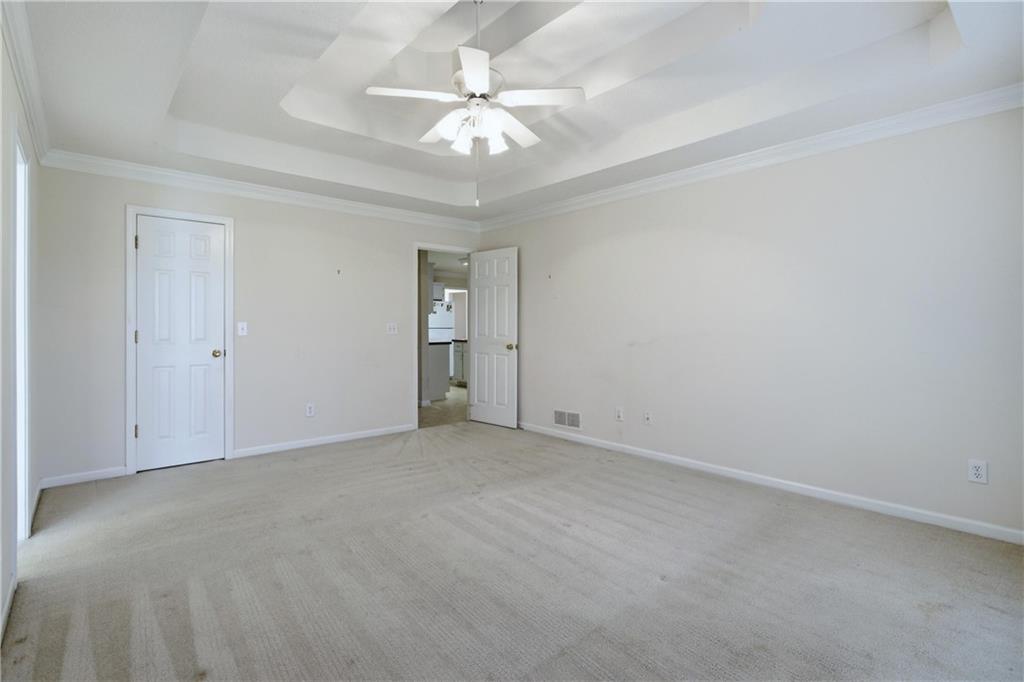 190 Cambridge Way Covington, GA 30016 - Photo 21 of 51 an empty room with chandelier fan