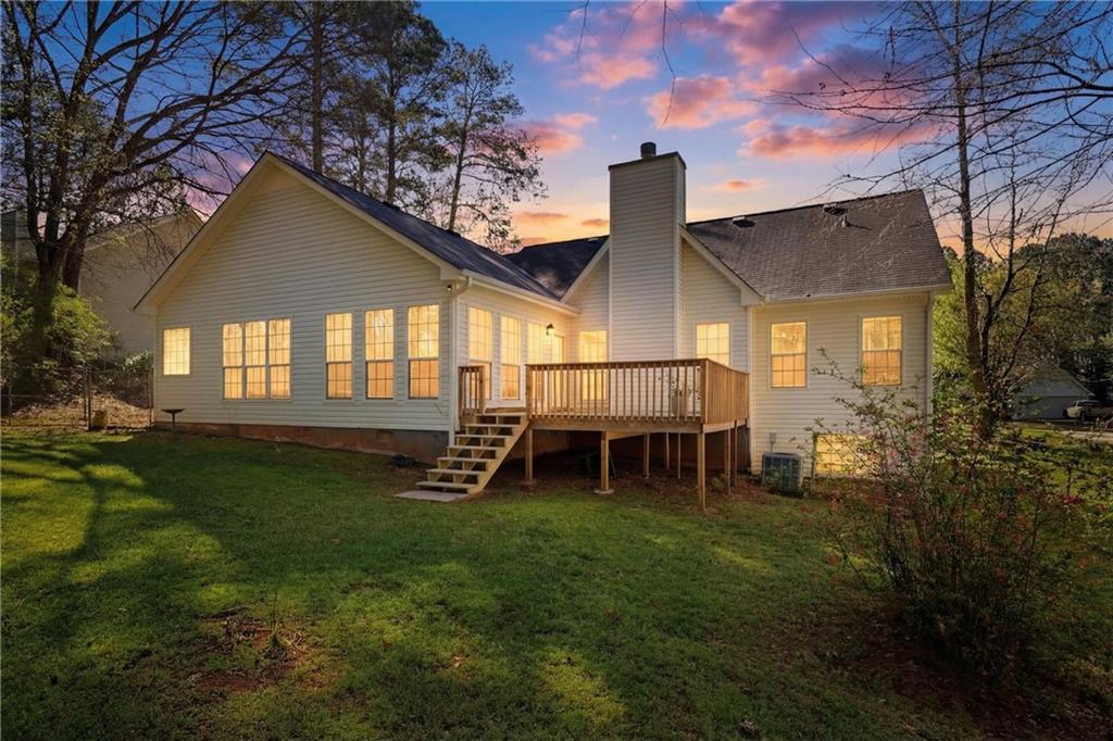 190 Cambridge Way Covington, GA 30016 - Photo 31 of 51 a view of a house with a backyard