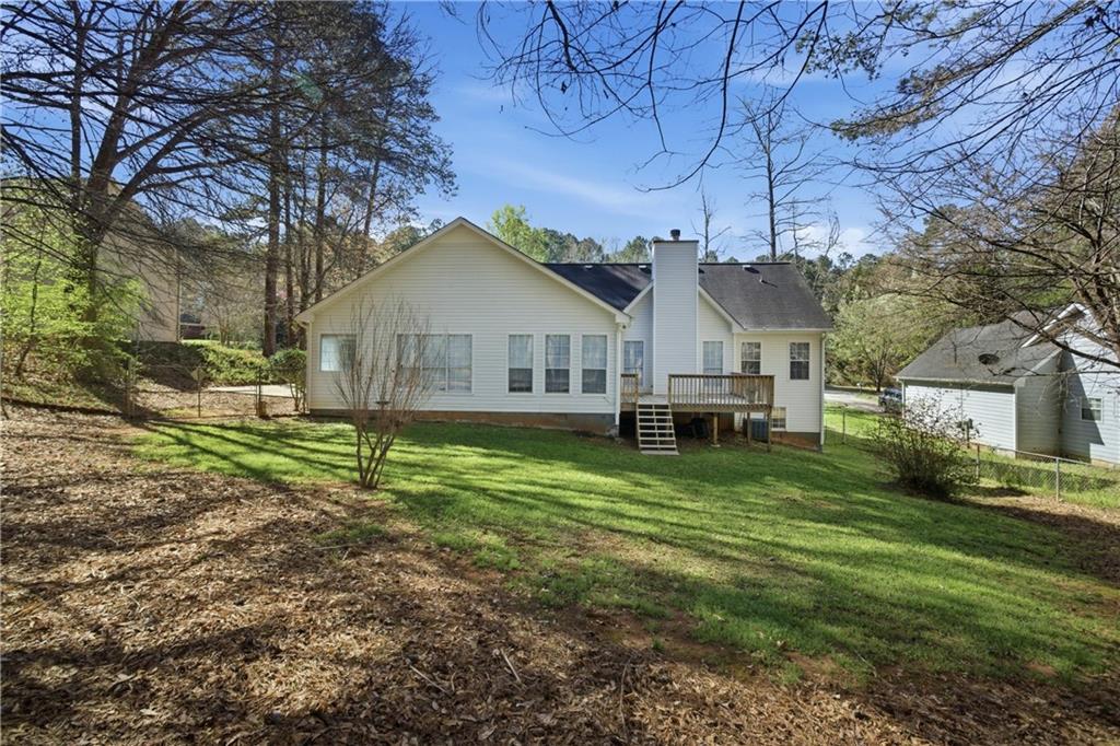 190 Cambridge Way Covington, GA 30016 - Photo 32 of 51 a view of a house with a yard