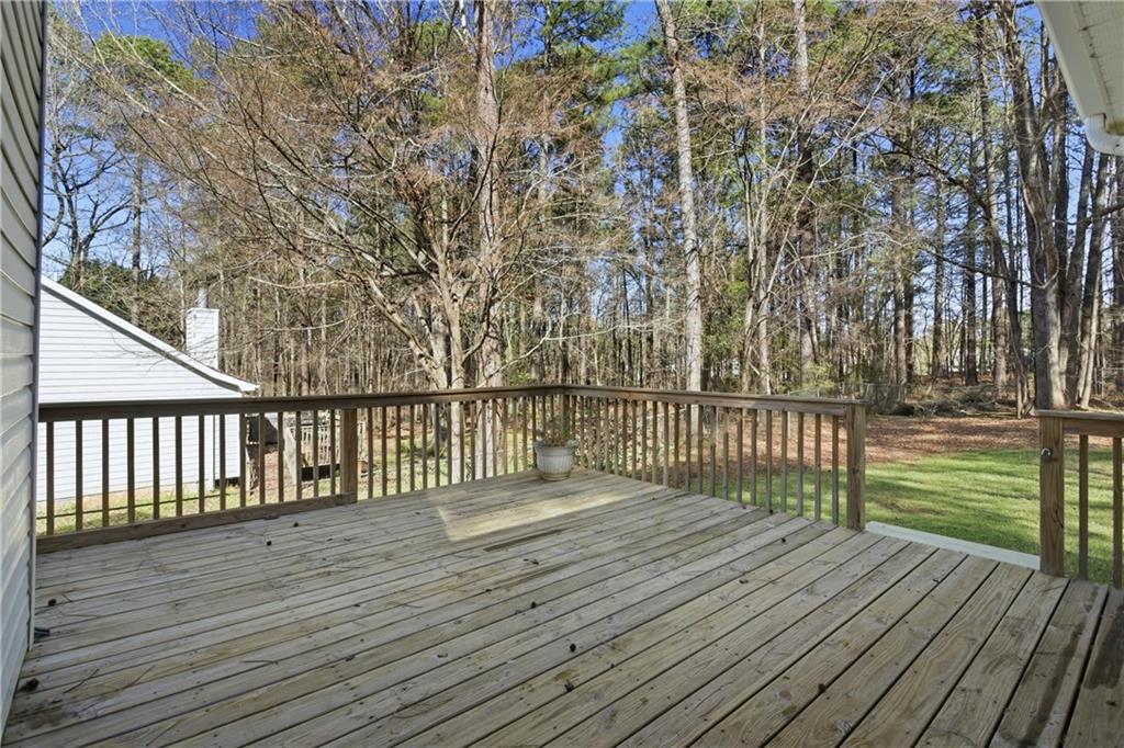 190 Cambridge Way Covington, GA 30016 - Photo 35 of 51 a view of a wooden deck