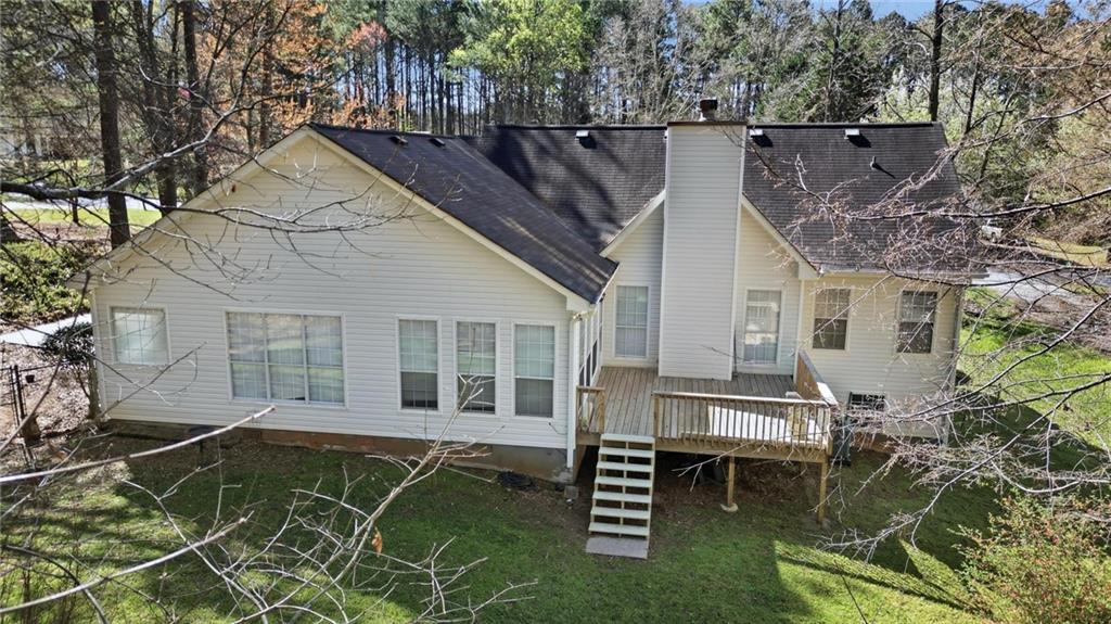 190 Cambridge Way Covington, GA 30016 - Photo 37 of 51 a backyard of a house with table and chairs