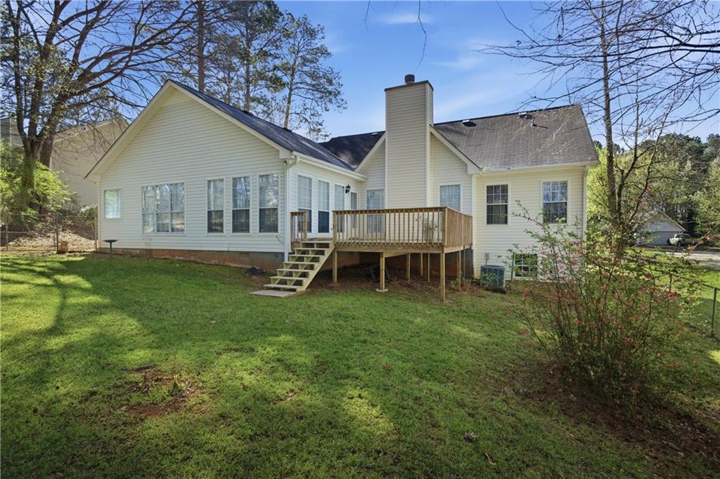 190 Cambridge Way Covington, GA 30016 - Photo 39 of 51 a backyard of a house with table and chairs