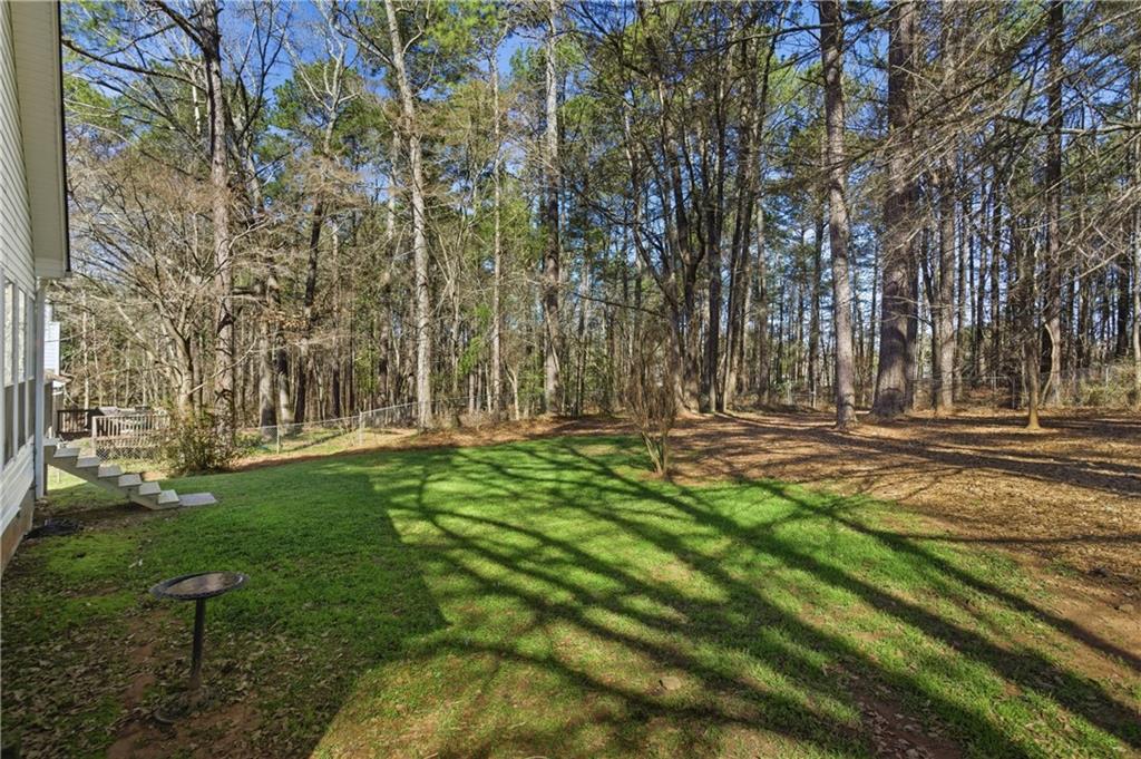 190 Cambridge Way Covington, GA 30016 - Photo 41 of 51 a view of outdoor space with garden
