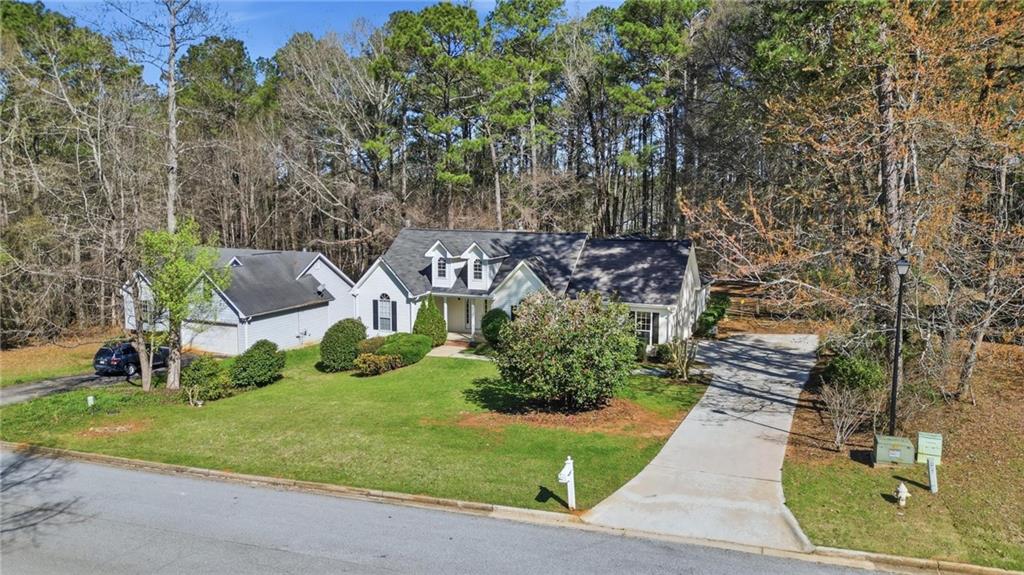 190 Cambridge Way Covington, GA 30016 - Photo 43 of 51 an aerial view of a house with a yard