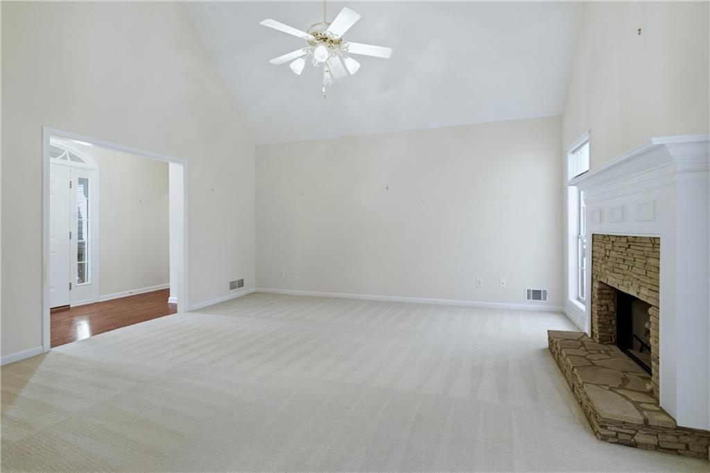 190 Cambridge Way Covington, GA 30016 - Photo 10 of 51 a view of empty room with fireplace