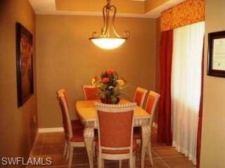 221 9th Street South, Unit 224 Naples, FL 34102 - Photo 8 of 8 a dining room with furniture and window