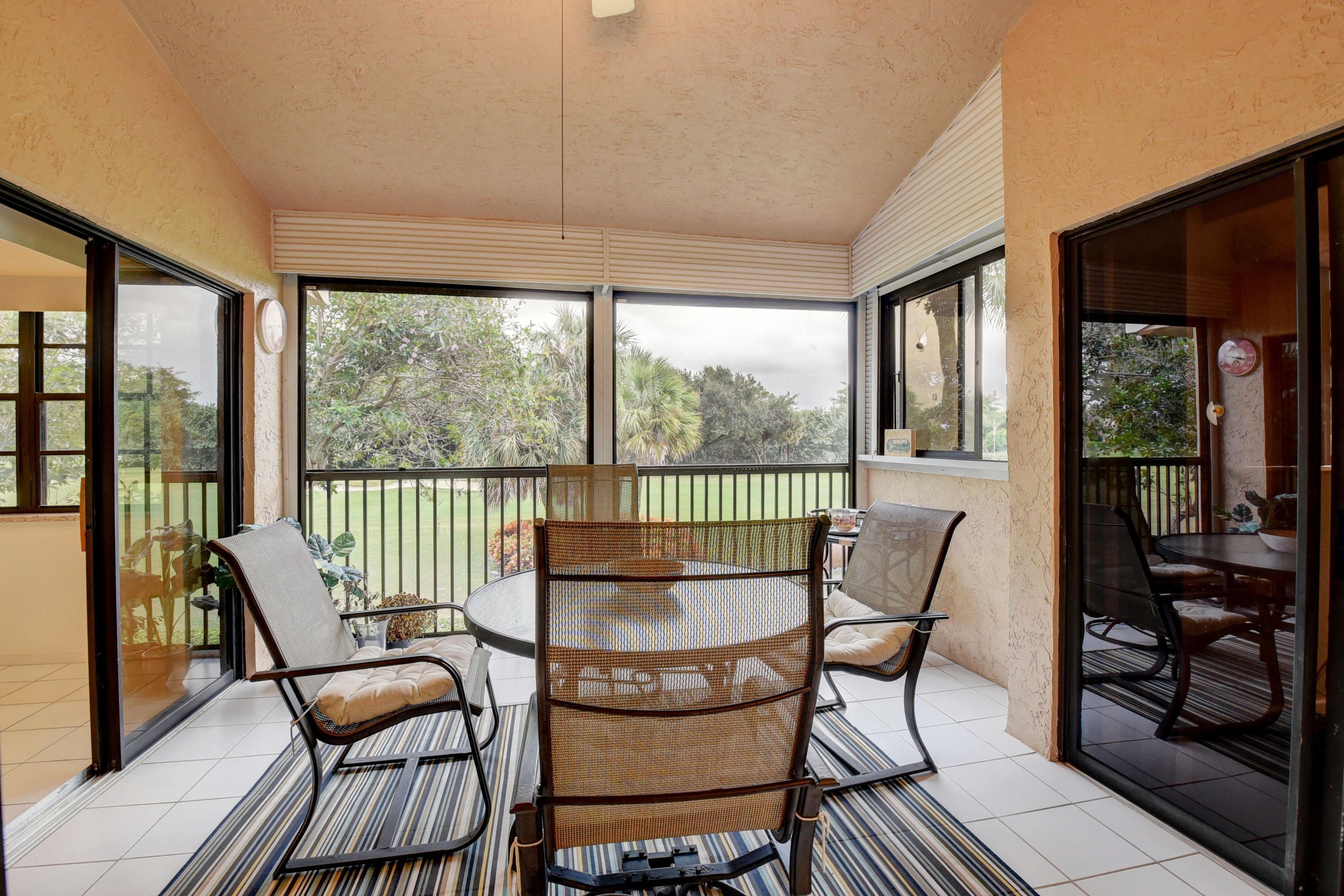 17380 Boca Club Boulevard, Unit 307 Boca Raton, FL 33487 - Photo 21 of 28 COVERED SCREENED PATIO