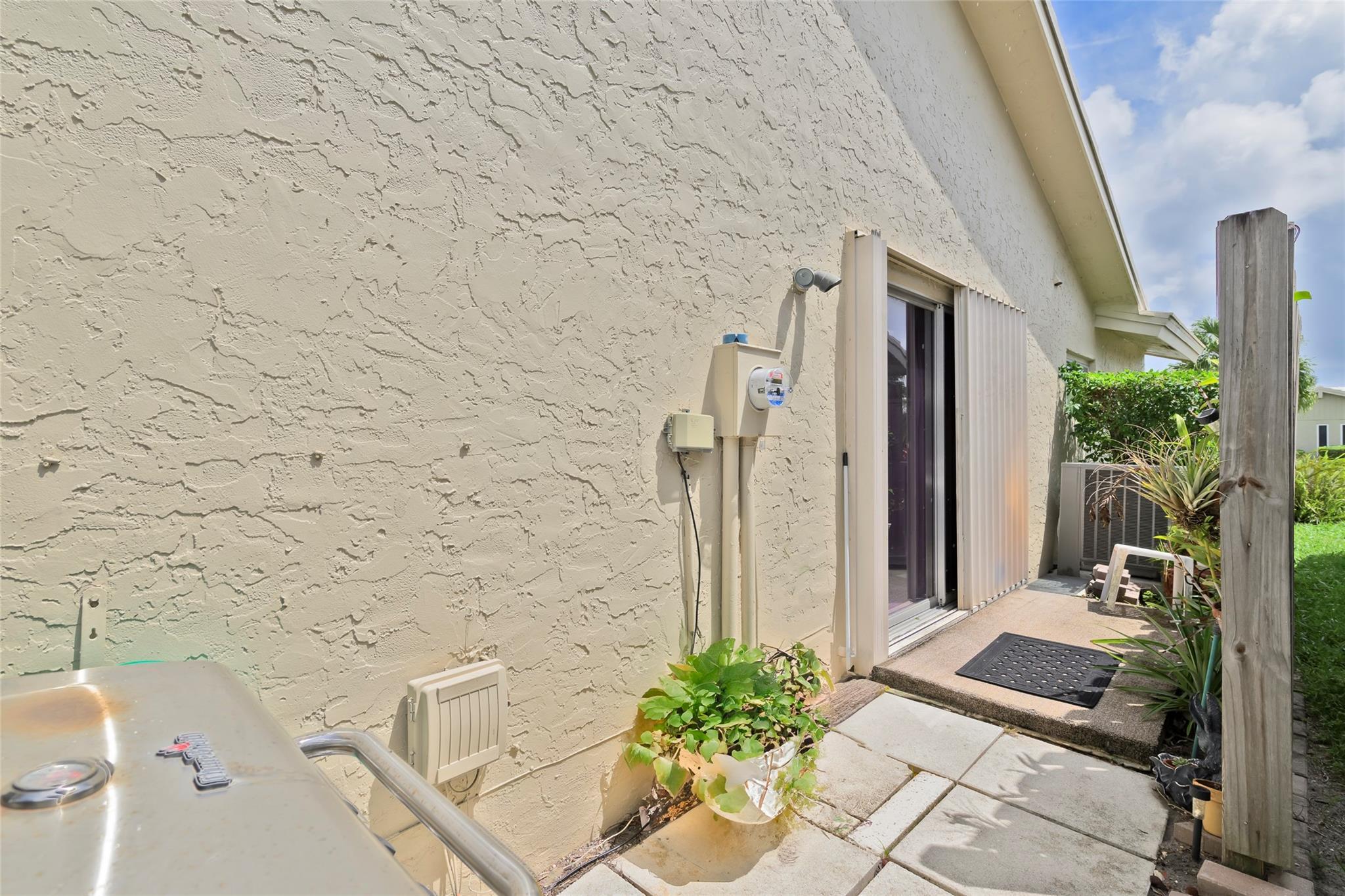 22349 Treetop Circle Boca Raton, FL 33433 - Photo 29 of 36 a bath room with a sink and a potted plant