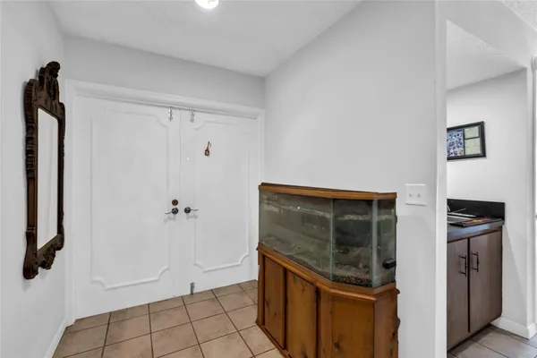 a bathroom with a shower and a sink