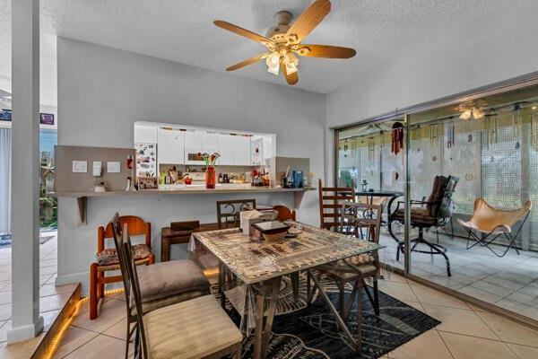 22349 Treetop Circle Boca Raton, FL 33433 - Photo 10 of 36 a view of a dining room with furniture