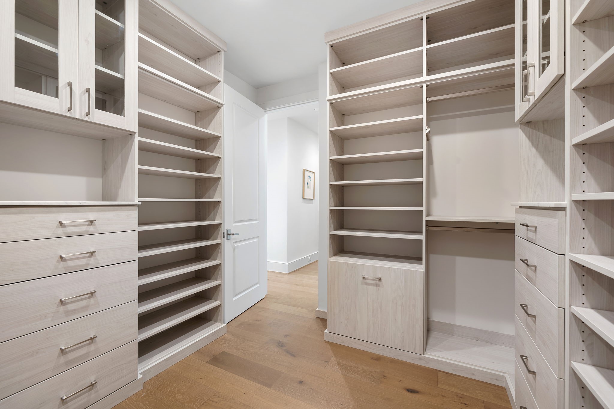 5656 San Felipe Street, Unit 1205 Houston, TX 77056 - Photo 33 of 45 a view of walk in closet with empty racks
