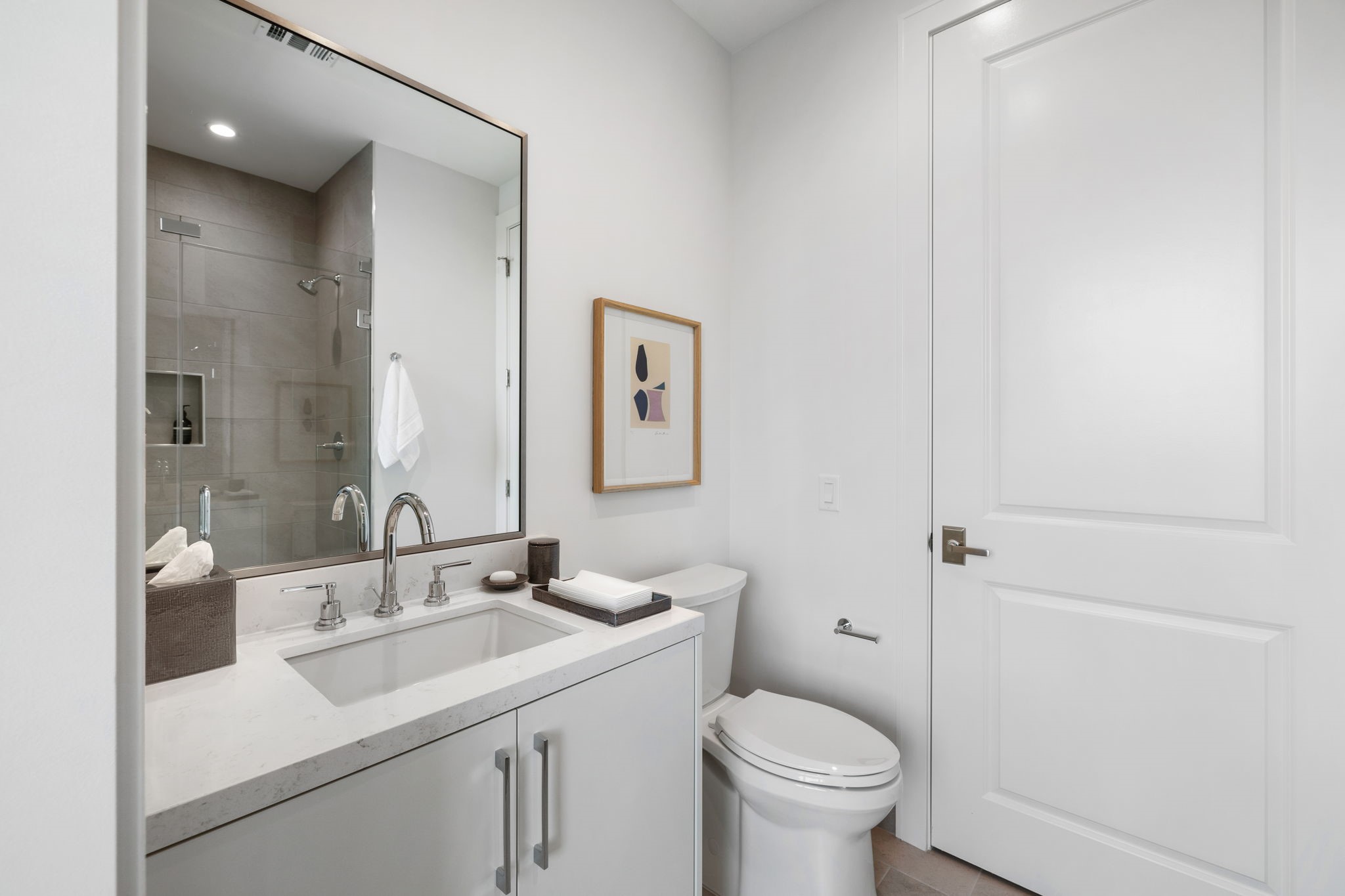 5656 San Felipe Street, Unit 1205 Houston, TX 77056 - Photo 40 of 45 a bathroom with a sink toilet and a mirror