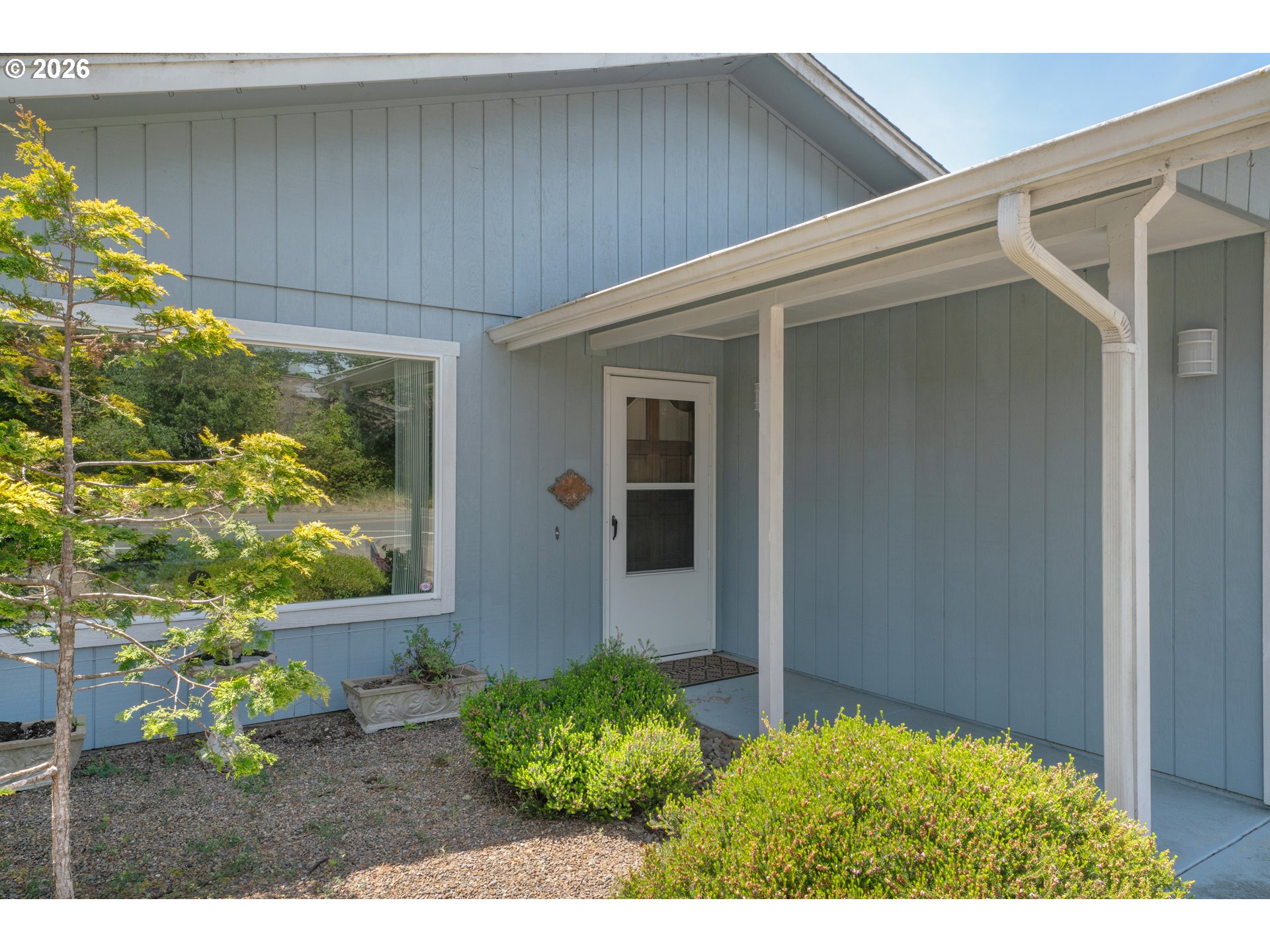 1142 9th Street Florence, OR 97439 - Photo 5 of 41 a view of a backyard