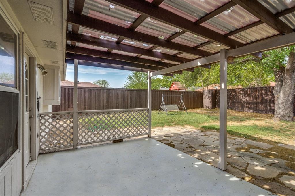 1509 Clover Drive Allen, TX 75002 - Photo 23 of 25 a view of a backyard of the house