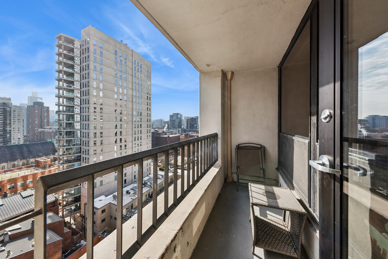 1030 North State Street, Unit 10K Chicago, IL 60610 - Photo 15 of 17 a view of balcony with furniture