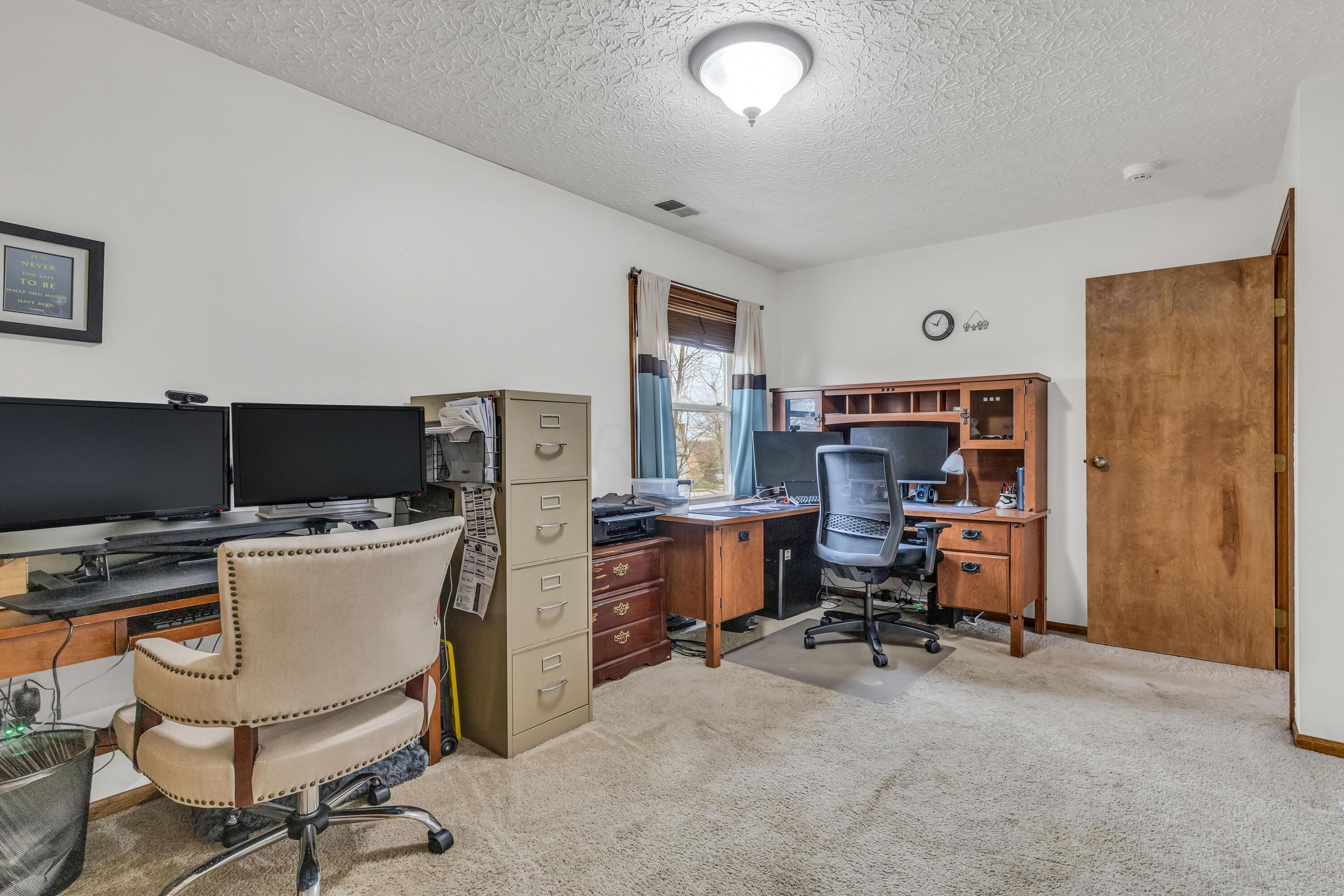 435 Emory Street Gahanna, OH 43230 - Photo 29 of 54 • Light sand carpet
• Ivory painted walls
• Ceiling light
• 2 door closet with
double sliding doors
• Drapes