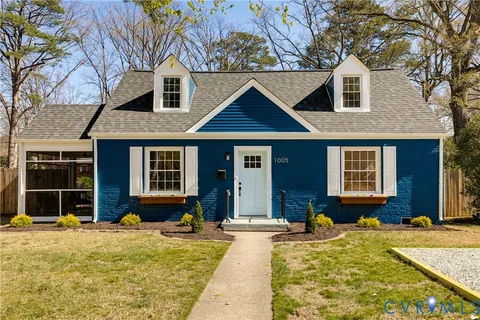 a front view of a house with swimming pool