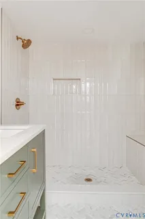 a view of backyard of house with wooden fence