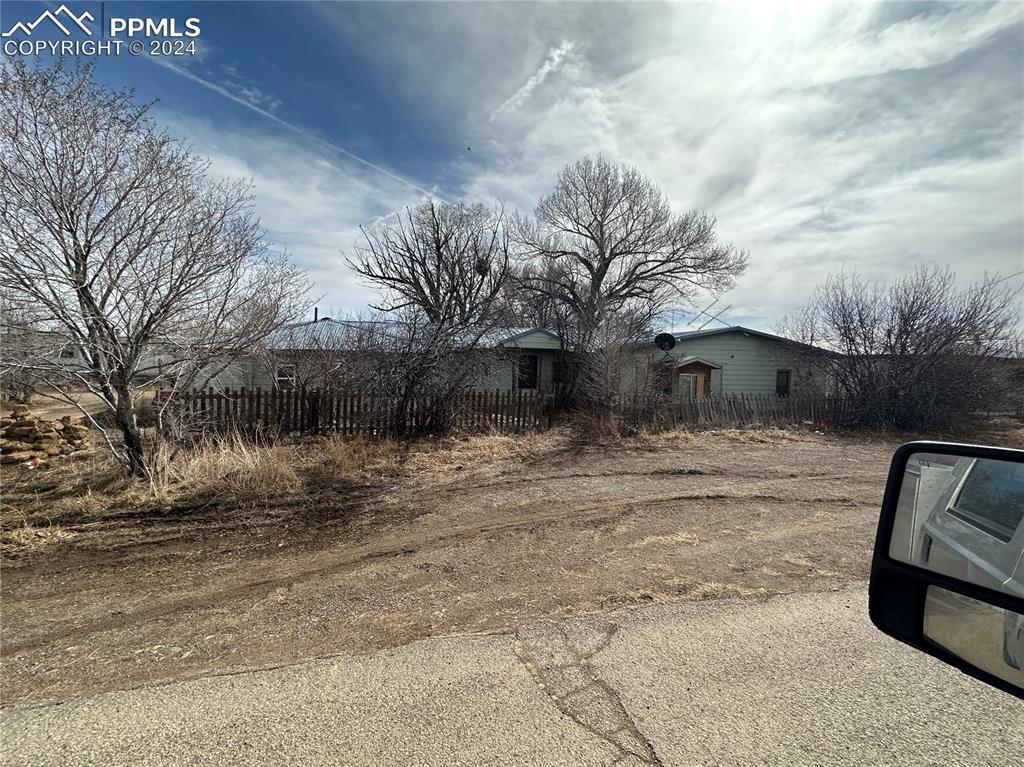 19894 County Road South Capulin, CO 81124 - Photo 4 of 9 a view of a yard with large trees