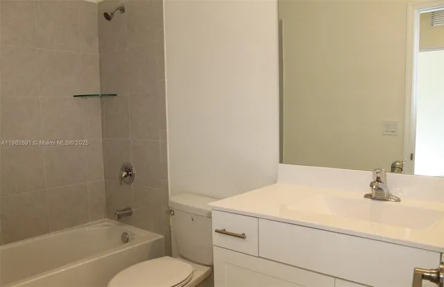 an empty room that has a mirror