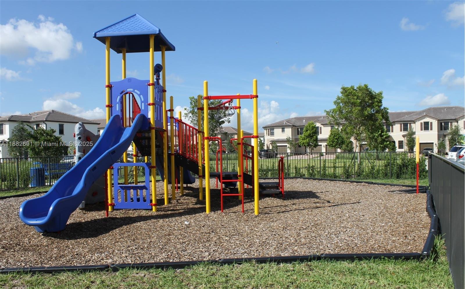 11100 West 33rd Way, Unit 11100 Hialeah, FL 33018 - Photo 24 of 26 a view of a house with a park