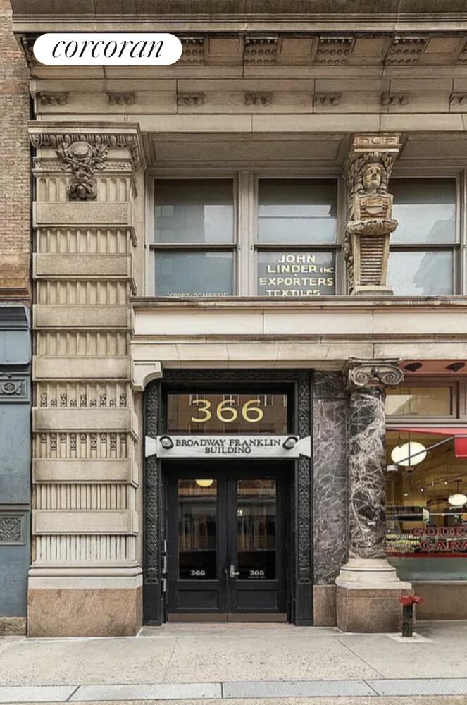 366 Broadway, Unit 4B Manhattan, NY 10013 - Photo 15 of 16 a black and white building with a sign on it
