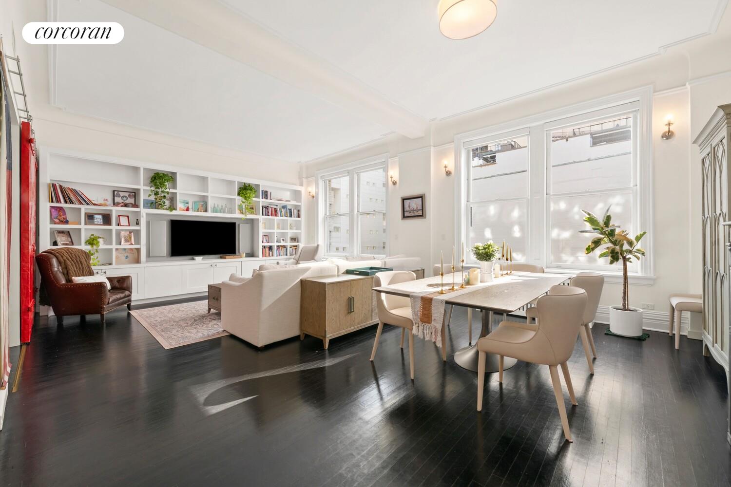 366 Broadway, Unit 4B Manhattan, NY 10013 - Photo 1 of 16 a living room with furniture wooden floor and a flat screen tv
