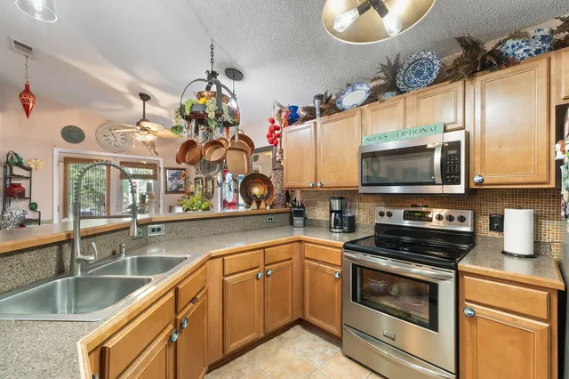 a bedroom with furniture and a wooden floor