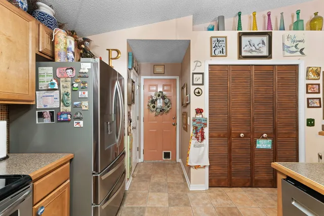 a spacious bathroom with a double vanity sink and mirror