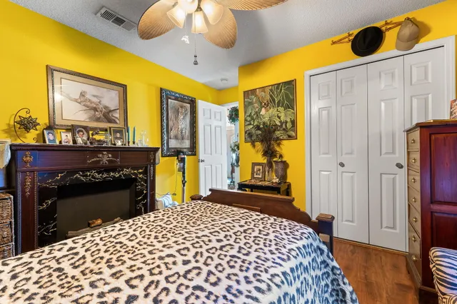 a view of a patio with table and chairs and potted plants