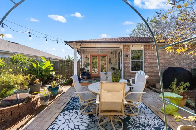 a bedroom with bed and a window