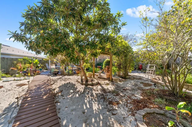 a backyard of a house with lots of green space