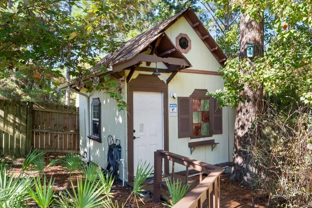 a backyard of a house with lots of green space