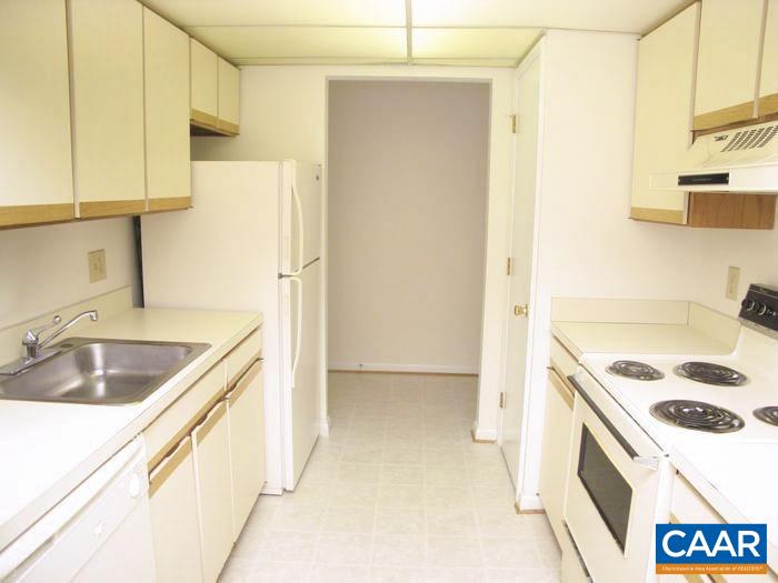 117 Turtle Creek Road, Unit 8 Charlottesville, VA 22901 - Photo 4 of 4 a kitchen with a sink a stove and a refrigerator