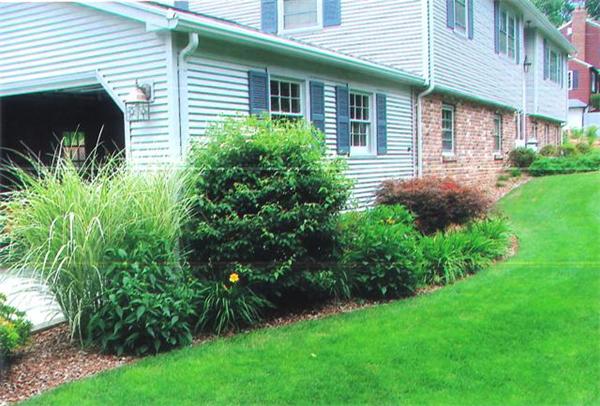 21 Blacksmith Road Wilbraham, MA 01095 - Photo 16 of 16 a view of a house with a yard and plants