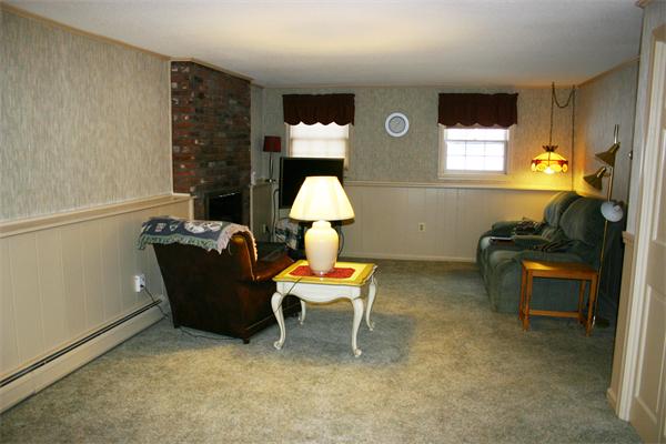 21 Blacksmith Road Wilbraham, MA 01095 - Photo 8 of 16 a room with furniture and a window