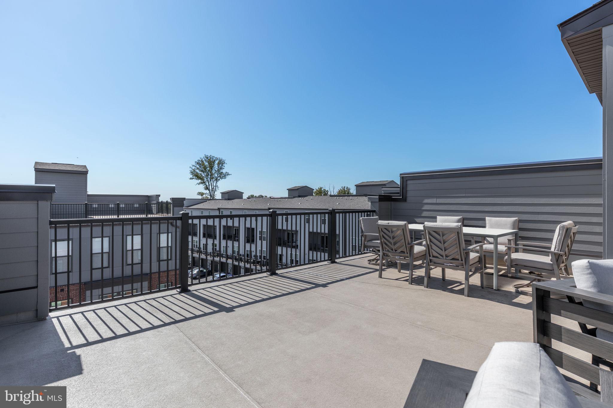 44485 Wolfhound Square Ashburn, VA 20147 - Photo 4 of 31 Roof top terrace (dining table virtually staged)