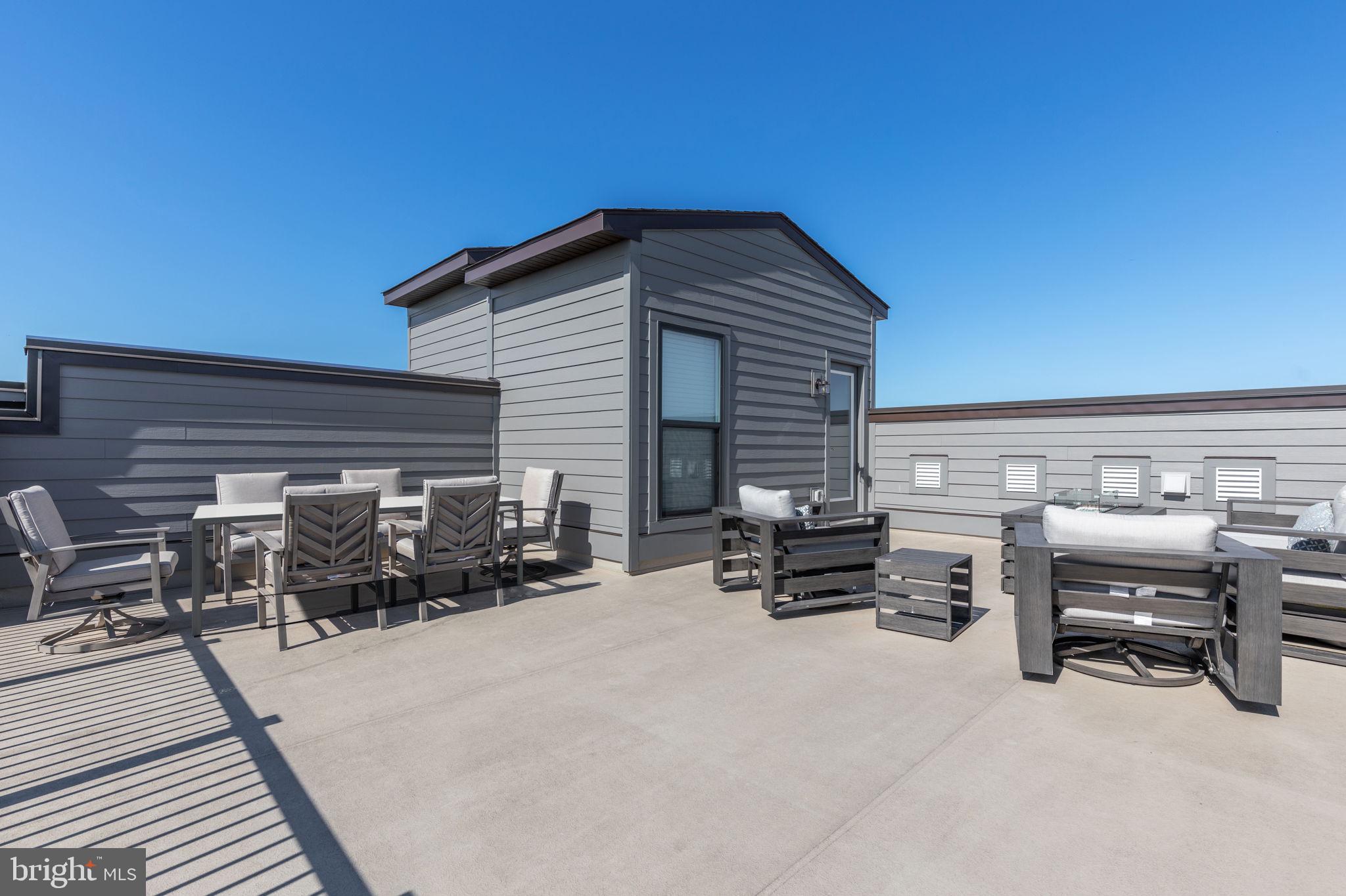 44485 Wolfhound Square Ashburn, VA 20147 - Photo 5 of 31 Roof top terrace (dining table virtually staged)